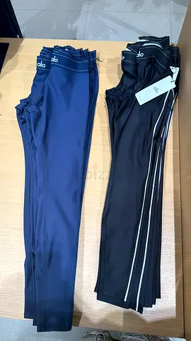 Two pairs of athletic leggings (black and navy) - like new