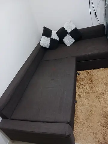 Ikea Brown fabric 3-seater sofa bed in good condition