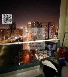 FULL CITY VIEW IN OASIS TOWERS , PRIME LOCTION ,100% FREEHOLD , EASY ACCESS TO DUBAI AND SHARJAH