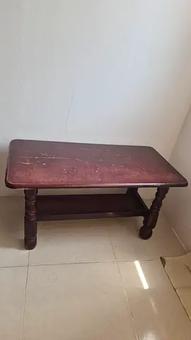 Solid wooden coffee table with turned legs — used, good for restoration