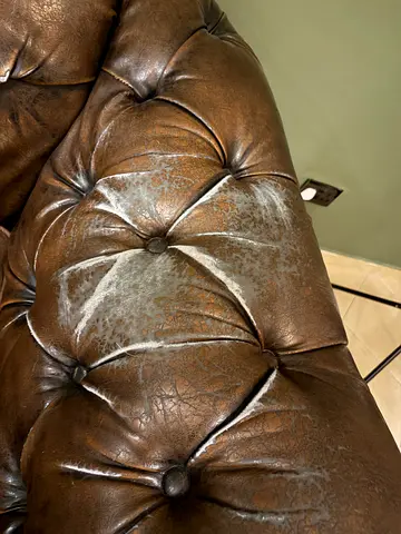 Used brown tufted leather sofa set - 3-seater (worn patina) and 2 seater (small tears)