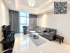 One-bedroom apartment with a balcony offering an city view, including parking, gym, and swimming poo