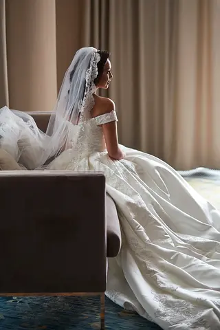 White off-shoulder wedding dress with lace veil - gently used