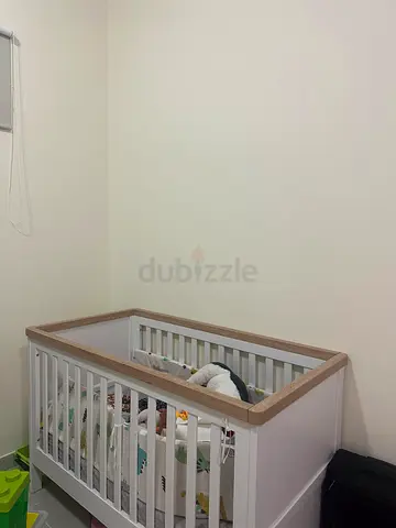 Modern White and Wood Baby Crib