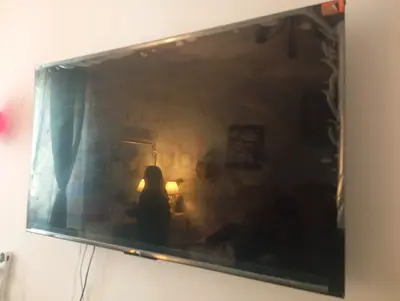 TCL 55-inch LED LCD TV - Wall Mounted, LIKE NEW- Good Working Condition.