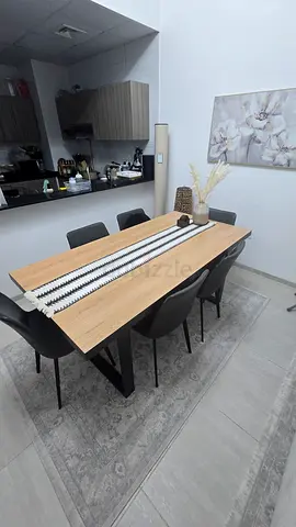 Oak dining table with 6 black chairs - modern set