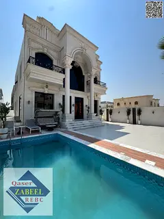 Luxury classic villa for sale in Ajman with a private pool.