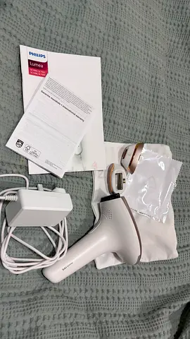 Philips Lumea IPL Hair Removal Device with Charger and Accessories