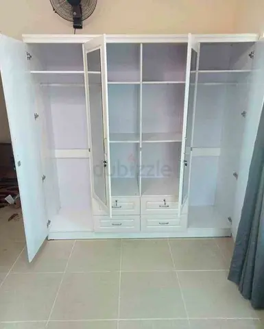 White 4‑door Wardrobe with Shelves and Drawers