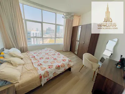 For sale: One-bedroom apartment with a living room, balcony, swimming pool, gym with private parking, and sea view at Al Orient Towers, Ajman