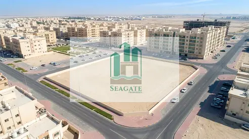 Residential Corner plot on two streets,Second plot from the main road – paved road, for Sale | Al Helio 2, Ajman