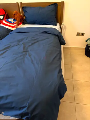 Wooden single bed with under-bed storage - solid look