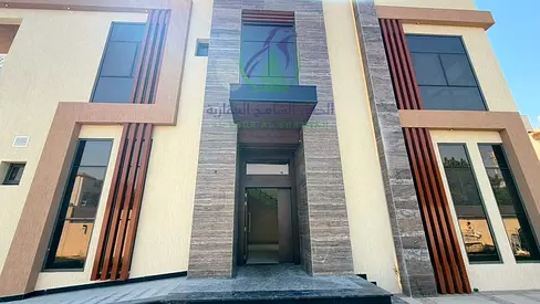 Brand-new 5BR master villa for rent in Al Goaz, Sharjah. Features maid's room, panoramic hall, covered parking, and up to 12 cheques.