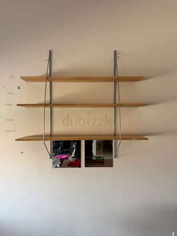 Wall-mounted wooden shelves with chrome supports - good condition