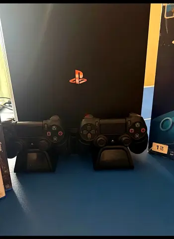 Ps4 pro 1TB with Controllers and Games