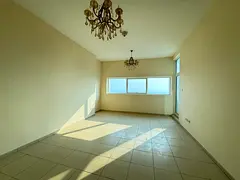 Two rooms and a living room, close to the Ajman and Sharjah Corniche; includes parking, a gym, a swi