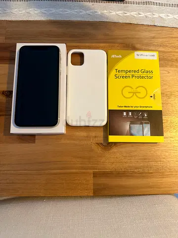 iPhone 11 with Charger, White Case and New Glass Screen Protector (all in excellent condition)