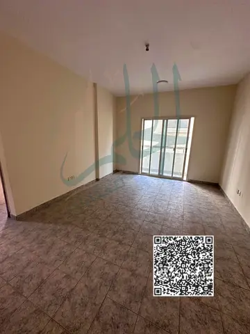 One-bedroom apartment with a living room for annual rent in Al Nuaimiya 2, Ajman.