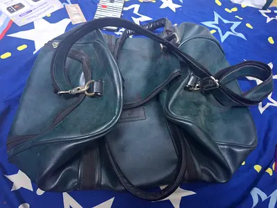 Used green leather duffel bag - spacious travel weekender