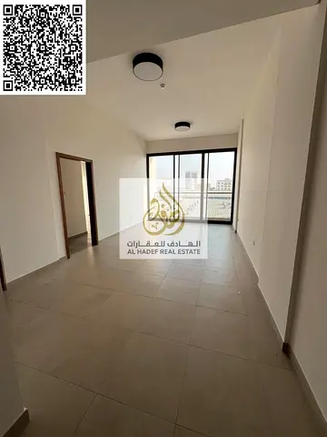 Second-tenant unit in Al-Jurf 2, near the Private School and the National School. It features a room, a living room, two bathrooms, and a balcony. The