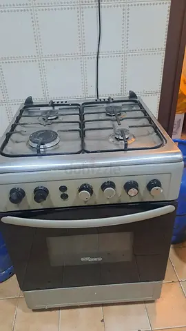 Used freestanding 4-burner gas stove with oven - good working condition