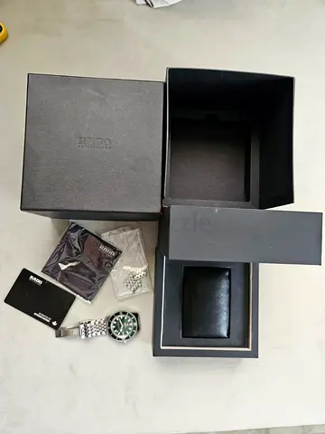 Rado men's stainless steel wristwatch with original box and extra link card