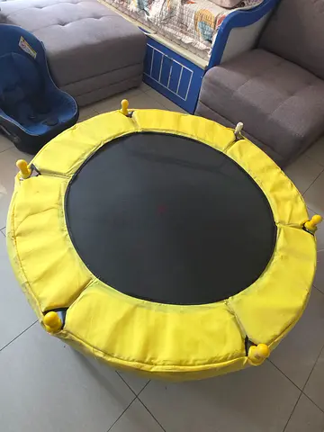 4.5 Ft round mini trampoline with safety nets - less used almost New