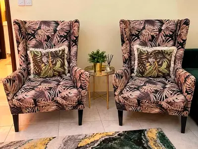 The One | Pair of patterned wingback armchairs - good condition