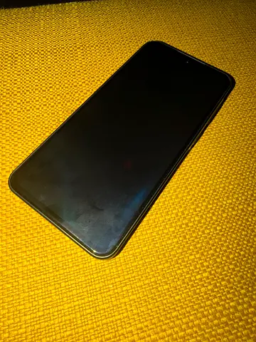 Used smartphone in good working condition - with cable