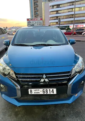 Mitsubishi Attrage 2021 GLX Medium Line GCC Specs along with number plate