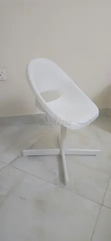 Modern White Plastic Swivel Side Chair on Metal Base