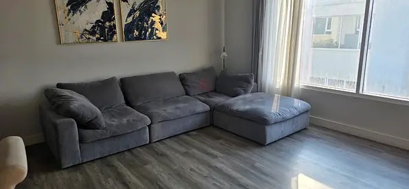 In PERFECT CONDITION Pan Emirates Pianca corner sofa with footstool