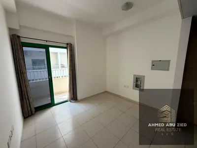 Spacious studio with balcony, open views, separate kitchen, gym, pool and parking, full owner maint
