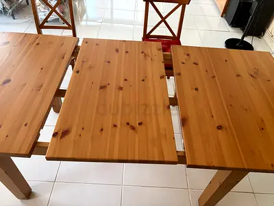 Solid wood extendable dining table (IKEA-style) - excellent condition