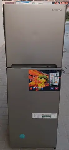 This No frost Daewoo Fridge Freezer, properly working condition. with light gray color.