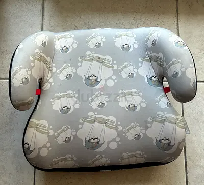 Used grey patterned booster seat (backless) for kids - good condition