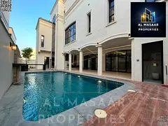 Luxury villa with high-end custom finishes, featuring a swimming pool, elevator, and spacious rooms.