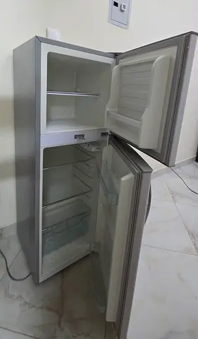 Compact double-door fridge/freezer, good working condition