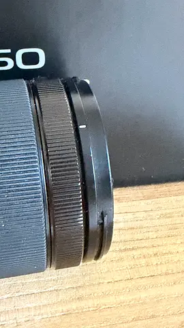 Used camera lens (mount/adapter visible) — good working condition