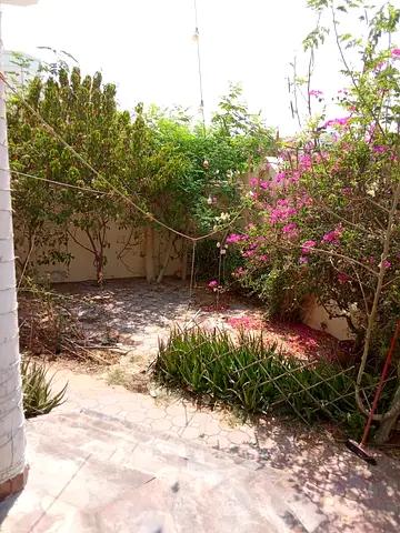 An upscale villa for annual rent in Al-Rifaa, featuring 4 bedrooms and 4 bathrooms (including two master bedrooms), a majlis, a maid's room, a laundry