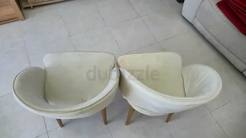 Pair of cream fabric lounge chairs