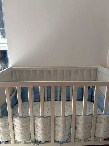 Crib + mattress + sheets + pillow + bumper