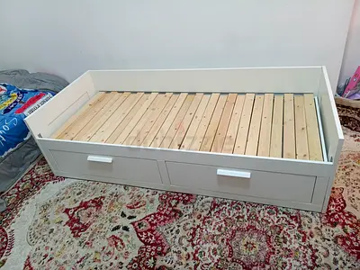 IKEA bremnis Day bed frame with underneath storage drawers and two mattresses