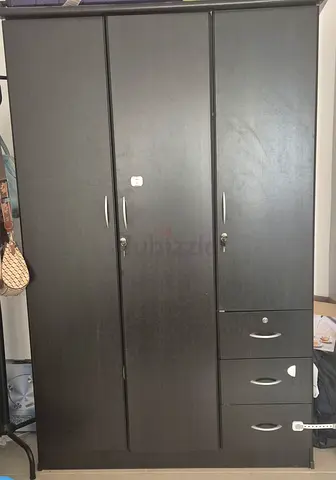 Dark wood 3-door wardrobe with 3 drawers - good condition