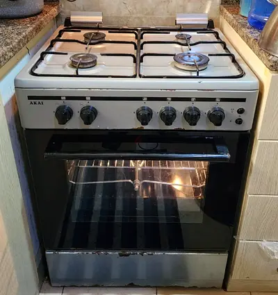 Used AKAI 4-Burner Gas Cooker with Oven - Good Working Condition