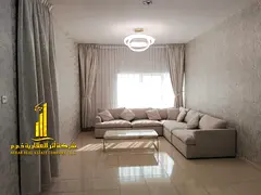 An ultra-luxurious 2-bedroom apartment with a living room at Orient Towers—featuring a gym, pool,