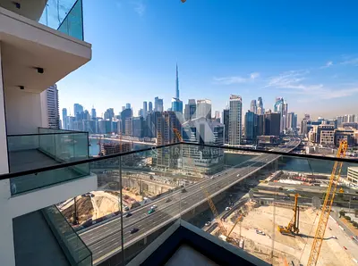 High-Floor 3BR Apartment | Burj & Canal View | Furnished