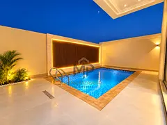 Luxury villa for sale with a private pool and spacious rooftop terrace. Freehold ownership available