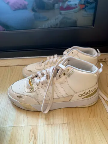 Light beige Adidas high-top sneakers, size not specified, gently used
