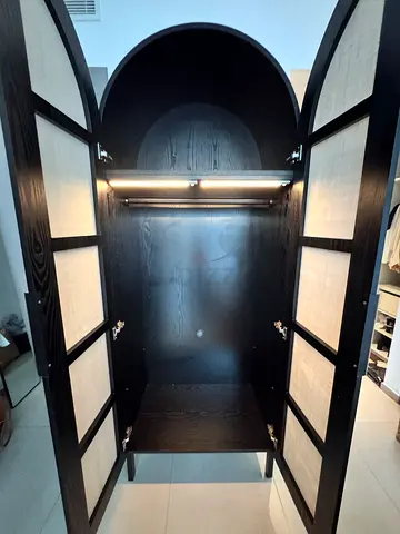 Black wooden armoire / wardrobe with rattan panels - excellent condition